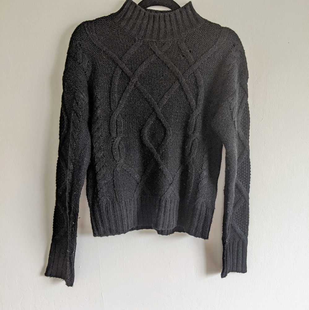 Black cable knit mockneck sweater